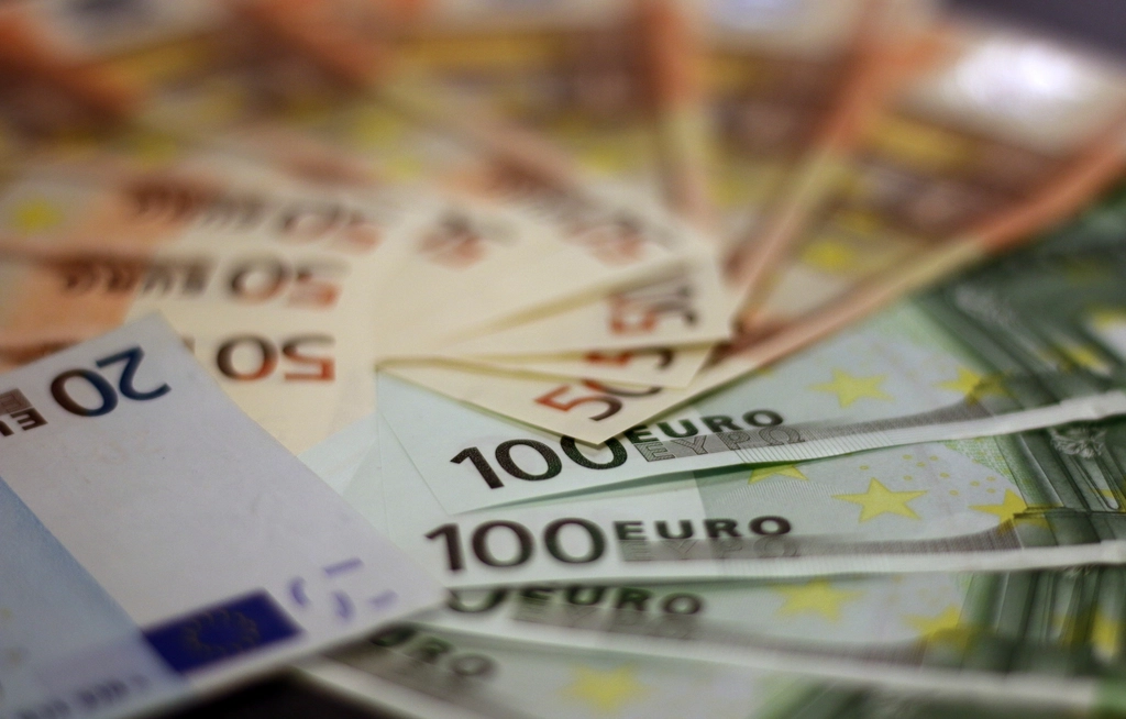 Closeup pile euro banknotes